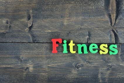 Fitness word on wooden table