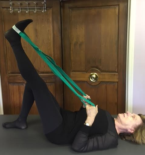 Here she is in an active isolated stretch before single leg circles.